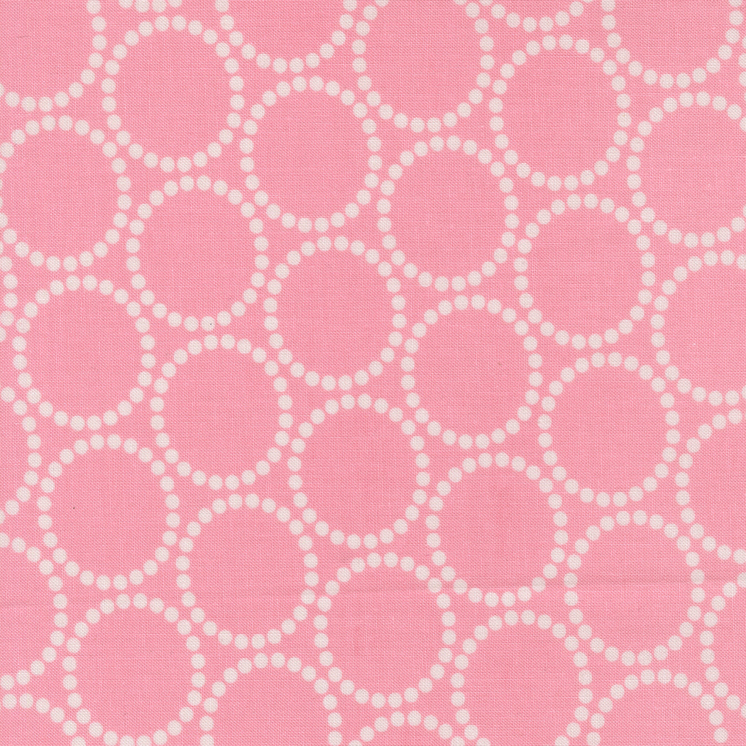 Pink fabric with white geometric pattern