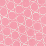 Pink fabric with white geometric pattern