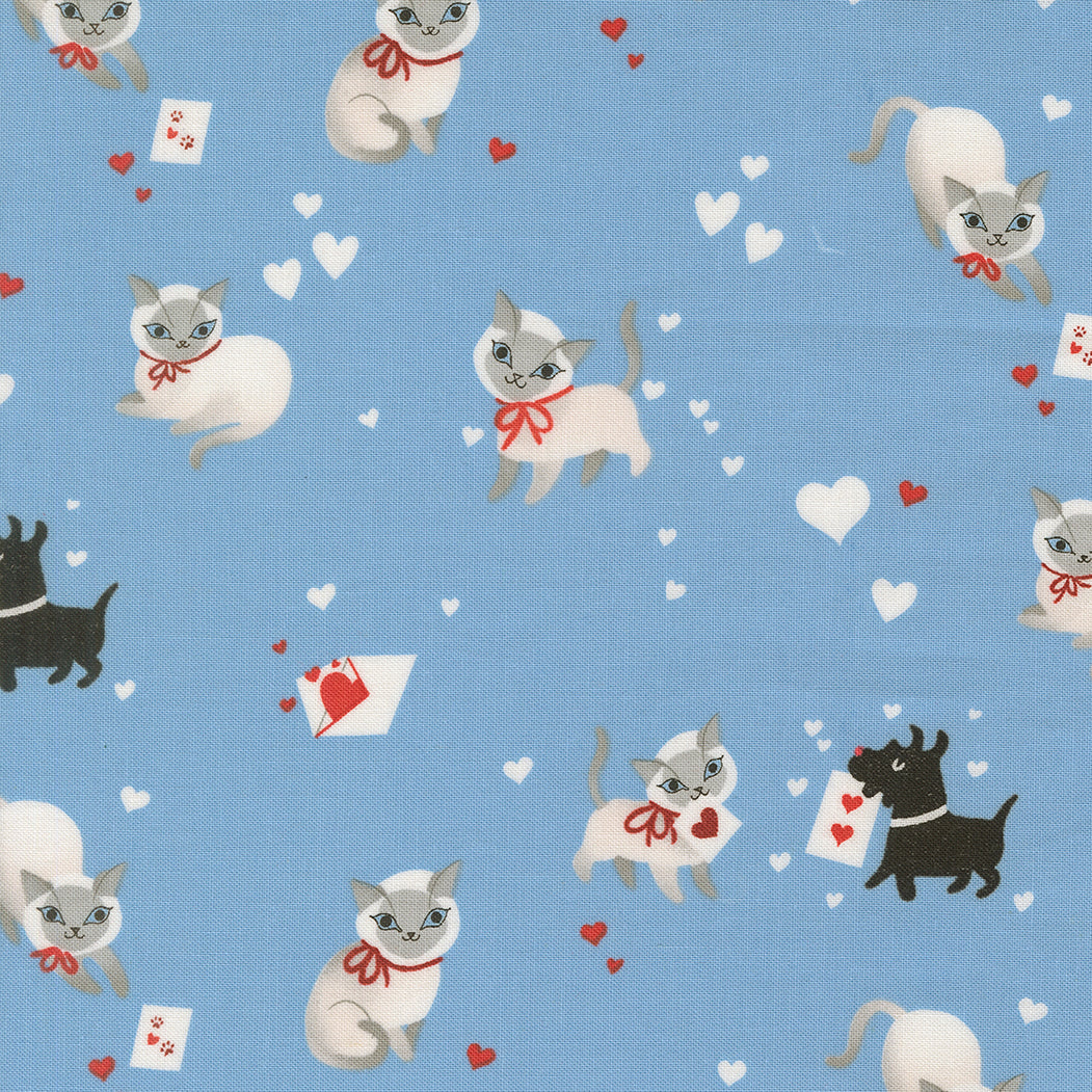 Pattern of cats, dogs, and hearts on a blue background