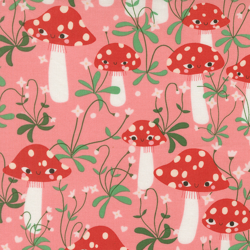 Pattern of red mushrooms with white spots on a pink background