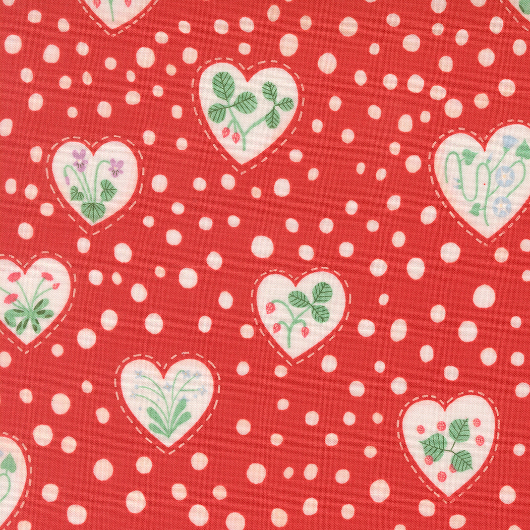 Pattern of white hearts with floral designs on a red background with white polka dots