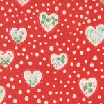 Pattern of white hearts with floral designs on a red background with white polka dots