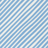 Pattern of blue and white diagonal stripes on a fabric background