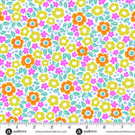 Colorful floral pattern with a ruler at the bottom for scale, on a white background.
