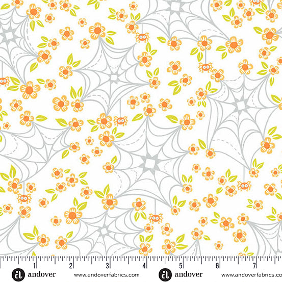 Fabric pattern with spider webs and flowers on a white background, featuring Andover Fabrics branding.