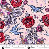 Floral and bird pattern with a ruler at the bottom for scale, on a pink background.