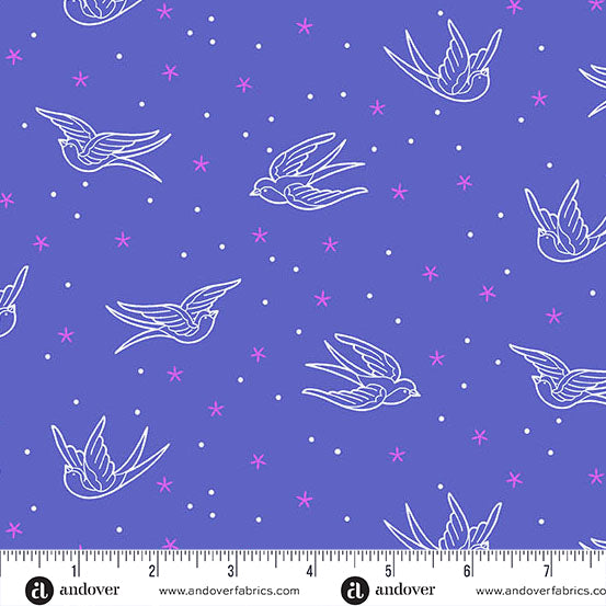 Pattern of white birds and pink stars on a blue background with a ruler for scale.