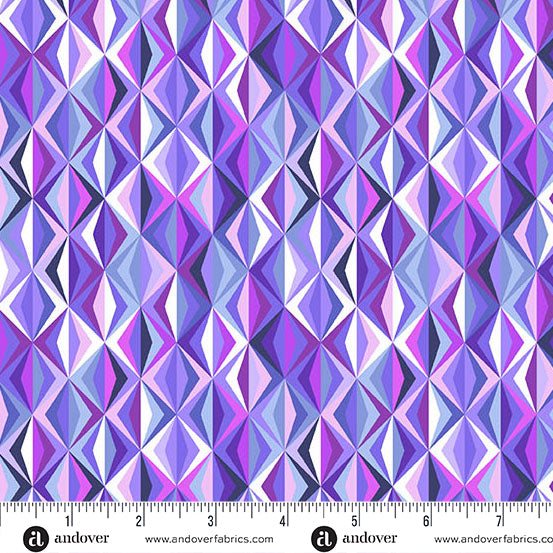 Geometric patterned fabric with a ruler at the bottom for scale, featuring shades of purple and pink.