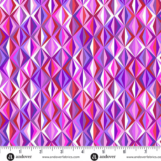 Geometric patterned fabric with a ruler at the bottom for scale, featuring shades of pink and purple.
