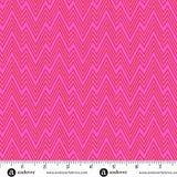 Pink fabric with zigzag pattern and a ruler at the bottom for scale.