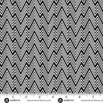 Black and white zigzag pattern fabric with a ruler at the bottom