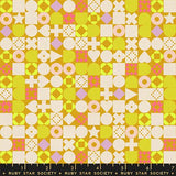 Patterned fabric with geometric shapes on a yellow background, featuring Ruby Star Society label.