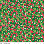 Fabric with strawberry pattern on a green background