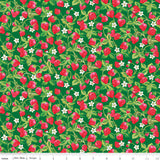 Fabric with strawberry pattern on a green background