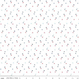 Pattern of small multicolored dots on a white background