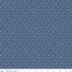 Fabric with small American flag pattern on a blue background