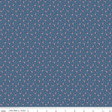 Fabric with small American flag pattern on a blue background