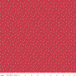 Red fabric with small black and white pattern