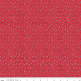 Red fabric with small black and white pattern