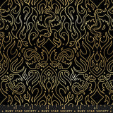 Gold dragon pattern on black fabric by Ruby Star Society