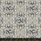 Decorative fabric pattern with dragons and swirls on a gray background, featuring Ruby Star Society label.