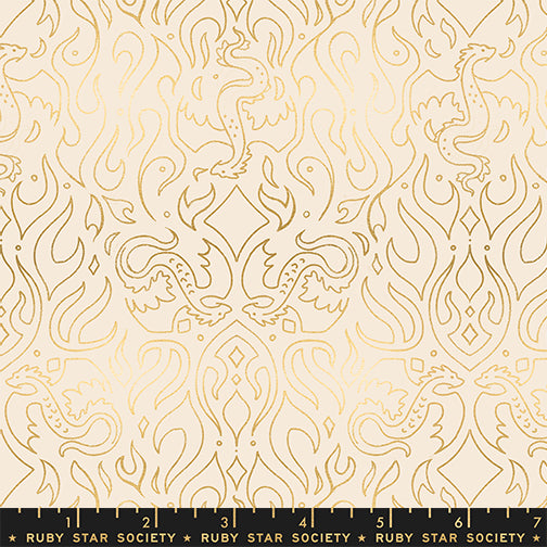 Gold patterned fabric with 'Ruby Star Society' label on a beige background