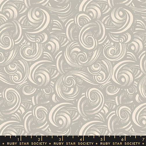 Patterned fabric with swirling designs on a gray background, featuring Ruby Star Society label.