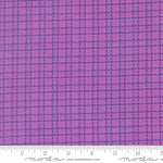 Purple fabric with a grid pattern and Moda label at the bottom.