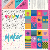 Colorful quilt with geometric patterns and text on a pink border