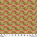 Pattern of red and green shapes on a fabric swatch