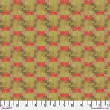Pattern of red and green shapes on a fabric swatch