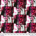 Patterned fabric with pink and black design on a white background, featuring a ruler at the bottom.