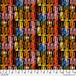 Colorful fabric pattern with a ruler at the bottom for scale