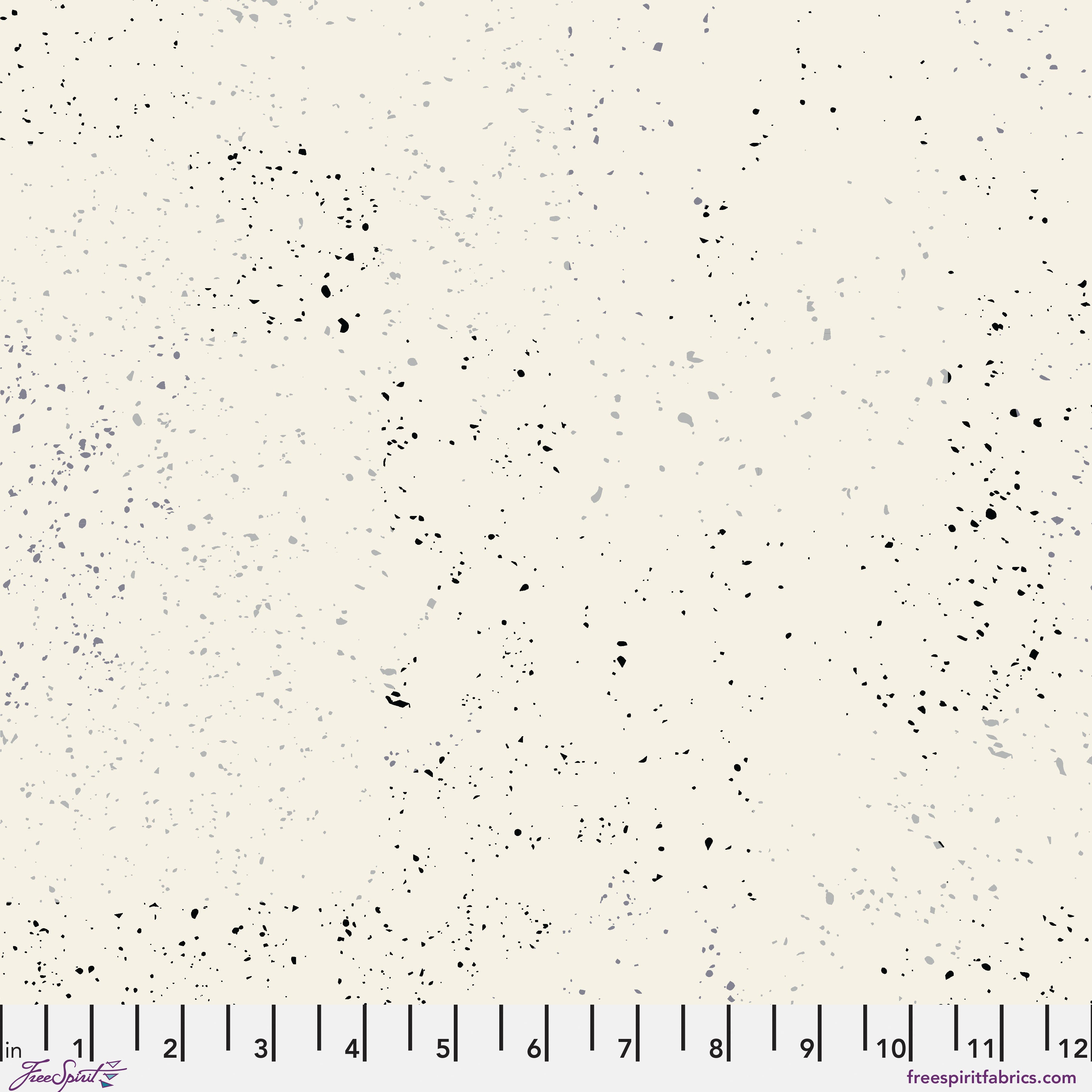 Speckled pattern fabric swatch on a white background with a ruler at the bottom.