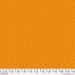 Solid orange fabric texture with a ruler at the bottom