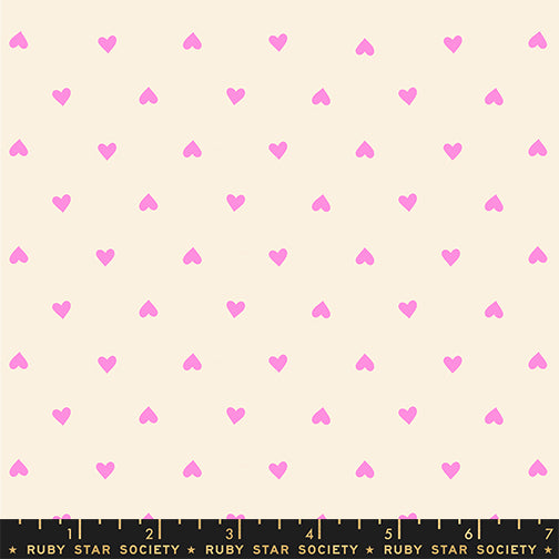 Pattern of small pink hearts on a beige background with Ruby Star Society label at the bottom.