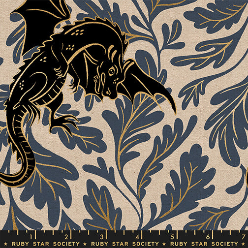 Fabric with dragon and leaf pattern in black and gold on a beige background, featuring Ruby Star Society label.