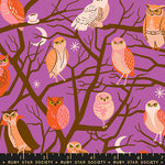Pattern of colorful owls on a purple background with a ruler at the bottom.