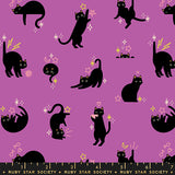 Pattern of black cats on a purple background with decorative elements, featuring the Ruby Star Society label.