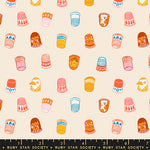 Pattern of colorful thimbles and sewing-related items on a beige background with Ruby Star Society label.