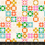 Colorful geometric quilt pattern with a ruler at the bottom, featuring Ruby Star Society branding.