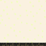 Fabric pattern with small green shapes on a beige background, featuring Ruby Star Society label.