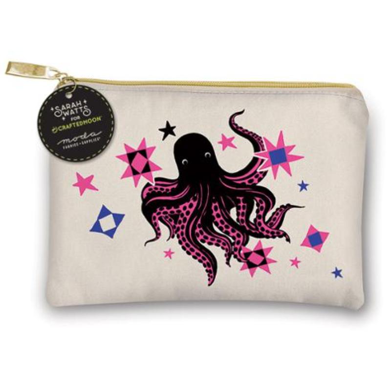 An off-white canvas zippered pouch featuring a black octopus design with pink polka dots, surrounded by pink and blue geometric star and flag motifs. A gold zipper and a black circular brand tag reading 'Sarah + Wyatt + Crafted Moon' are visible.