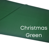 Confetti Cotton Christmas Green Solid Fabric by Riley Blake