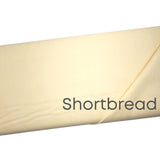 Confetti Cotton Shortbread Yellow Solid Fabric by Riley Blake