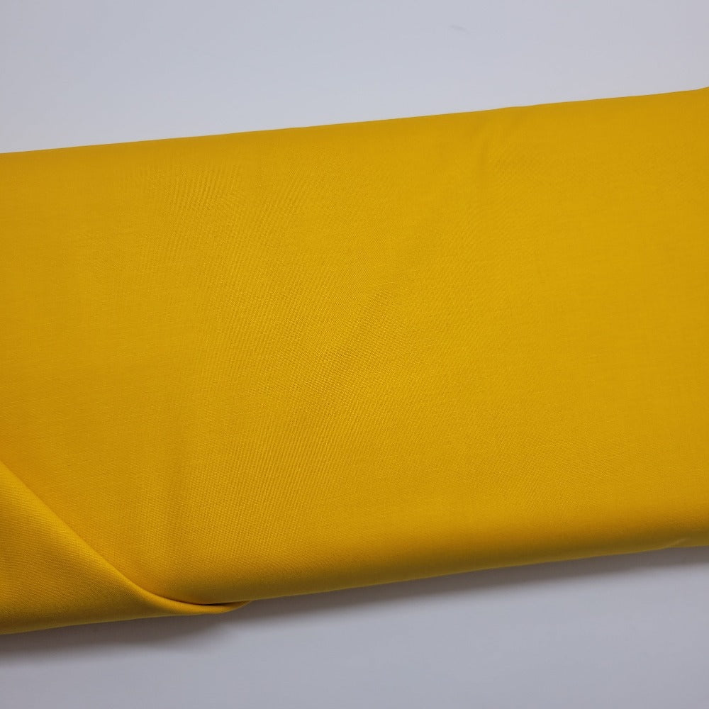 Tula Pink Solids Dragon's Breath Marigold Yellow Orange Fabric